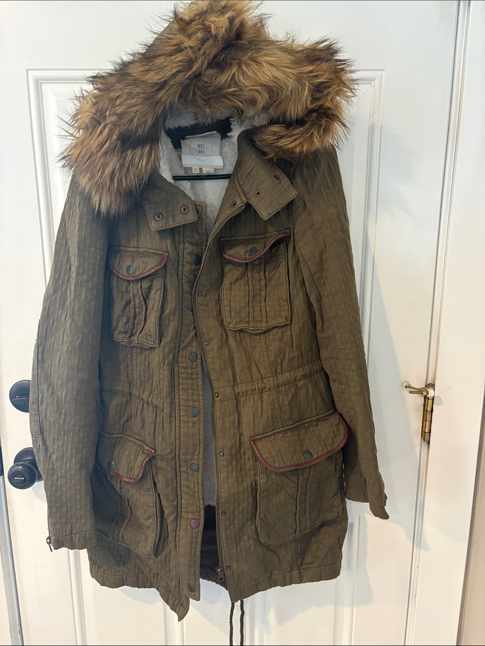 Quilted Olive Parka with Faux Fur Hood. Removable Sherpa and fur lining.